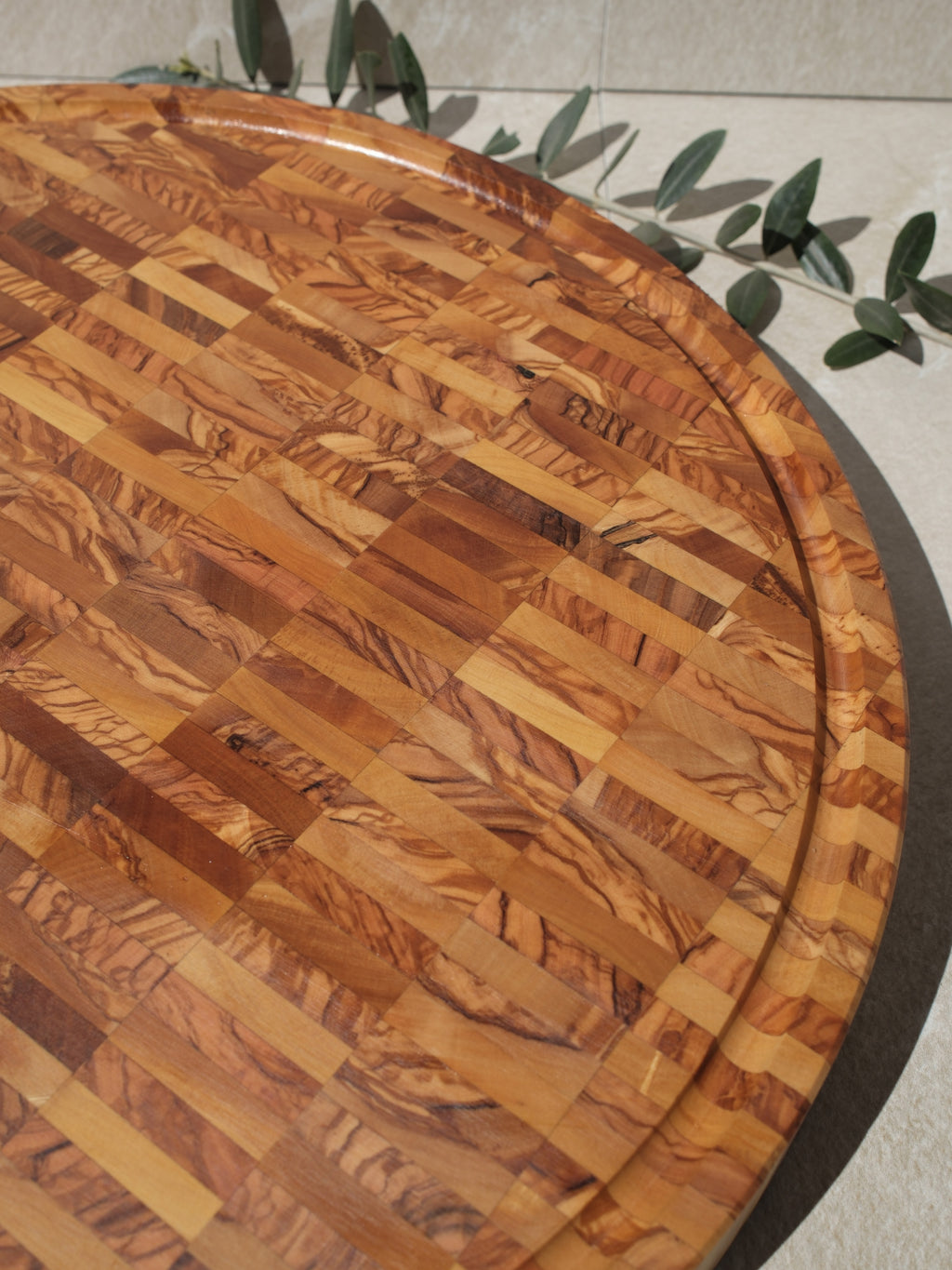 Tagliere a mosaico rotondo